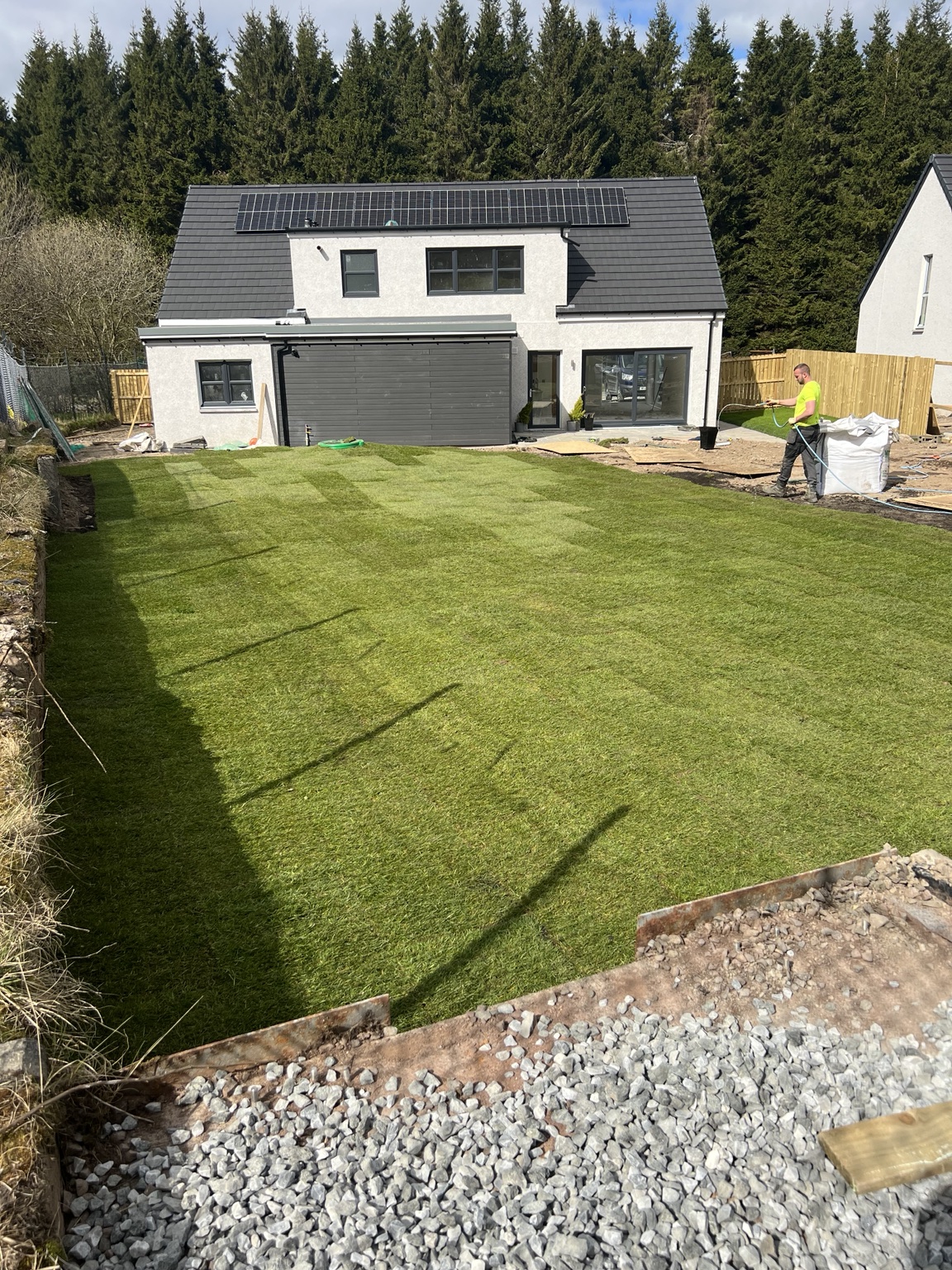Garden formation and turf installation during the finishing stage
