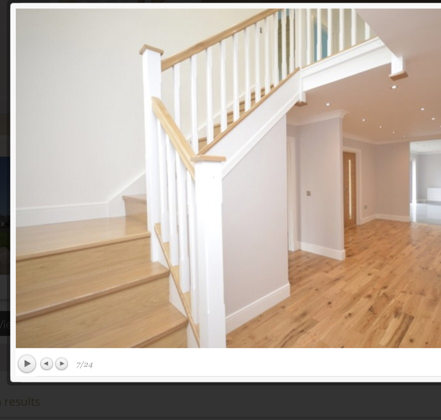 Bespoke painted staircase with natural timber treads and handrail